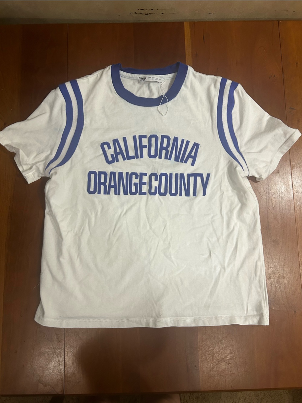 Zara White T-Shirt with Blue Trim & Text
